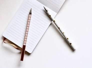 One-notepad-and-two-pens
